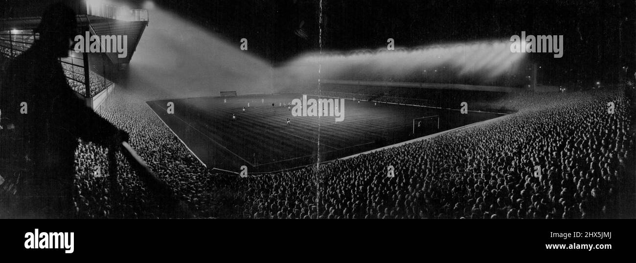 A London News Chronicle photograph of the introduction of football under lights at Arsenal Stadium. April 4, 1952. Stock Photo