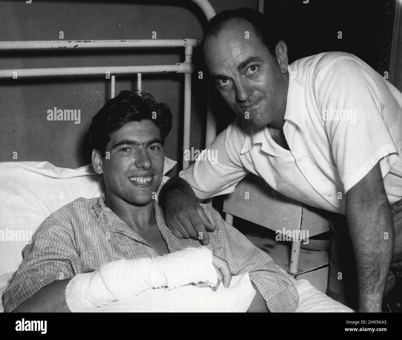 Helmut Scheidl left and Luke de Beyer - Shark attack. March 22, 1955. Stock Photo