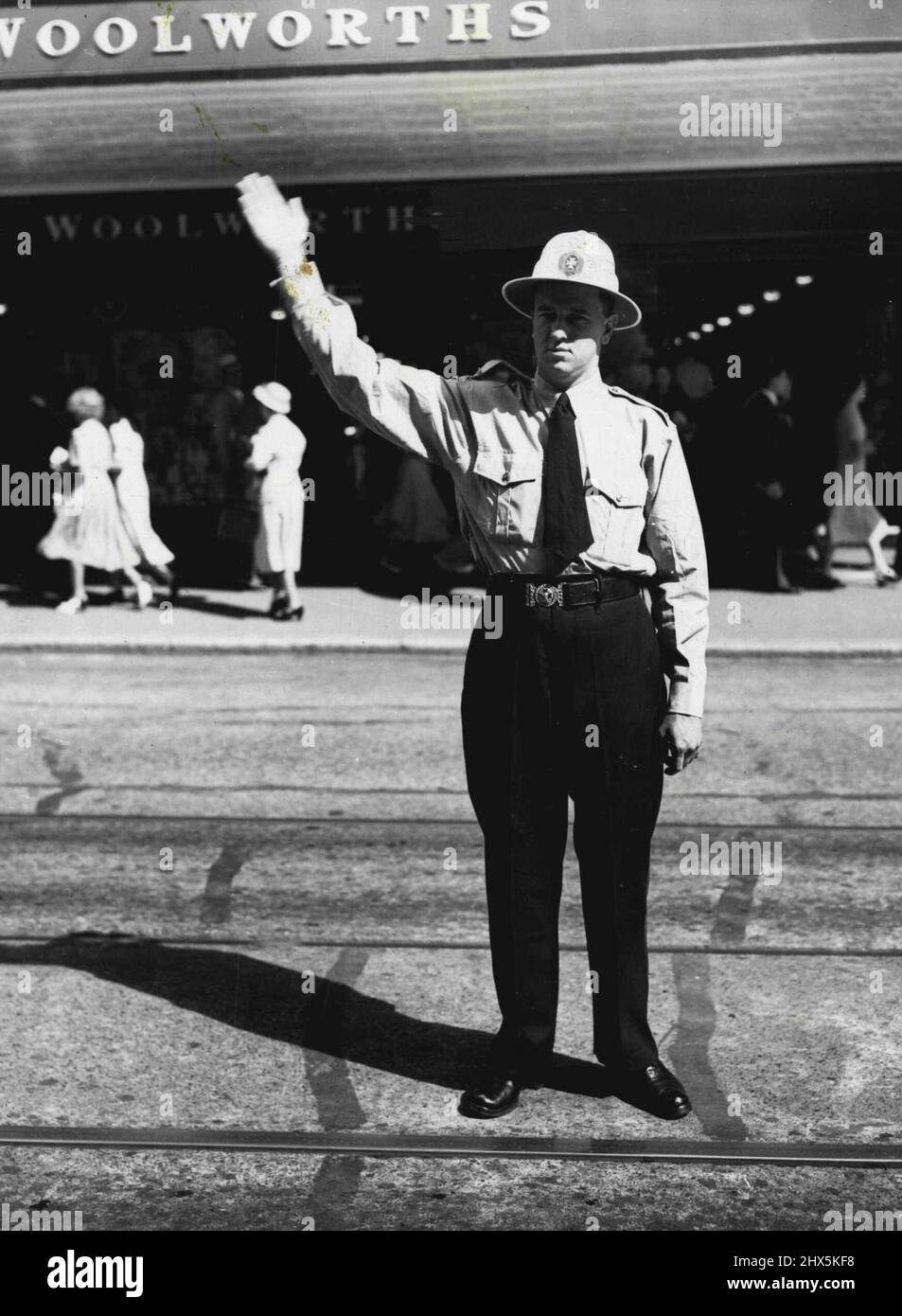 Queensland policeman cool and comfortable on shirt and slacks. Queensland policeman in summer uniform. January 27, 1953. (Photo by Brisbane Telegraph Feature Service). Stock Photo