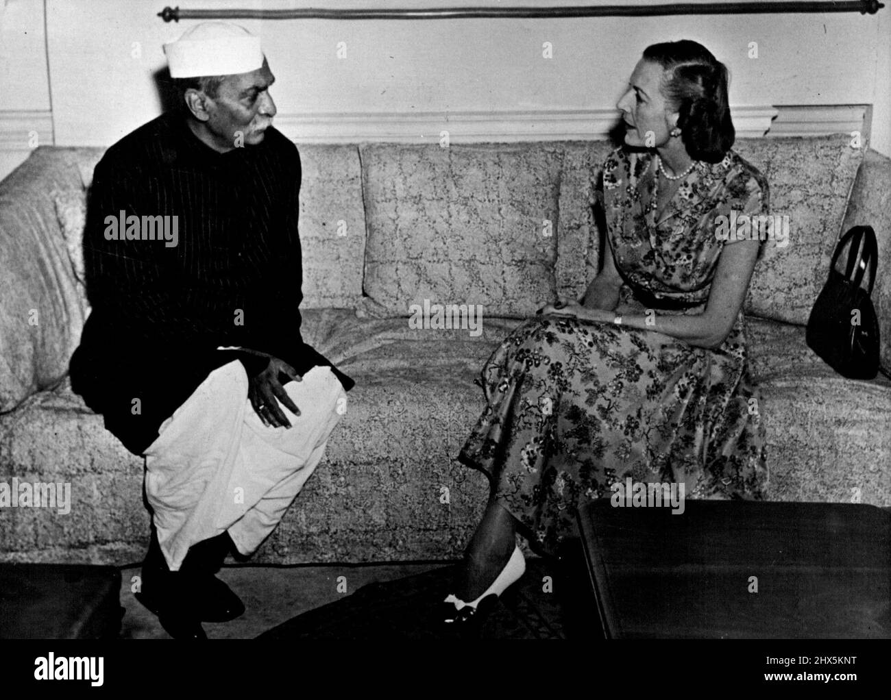 Countess Mountbatten tours The Far East -- The Countess Mountbatten chatting with the president of India at government house, Delhi. Countess Mountbatten, wife of Earl Mountbatten, the last man to be viceroy of India, is touring the far east. She is visiting welfare centres on behalf of the red cross and the order of Saint John. While in India she visited The President, Dr. Rajendra Prasad, at government house. March 03, 1952. (Photo by Paul Popper Photo) Stock Photo