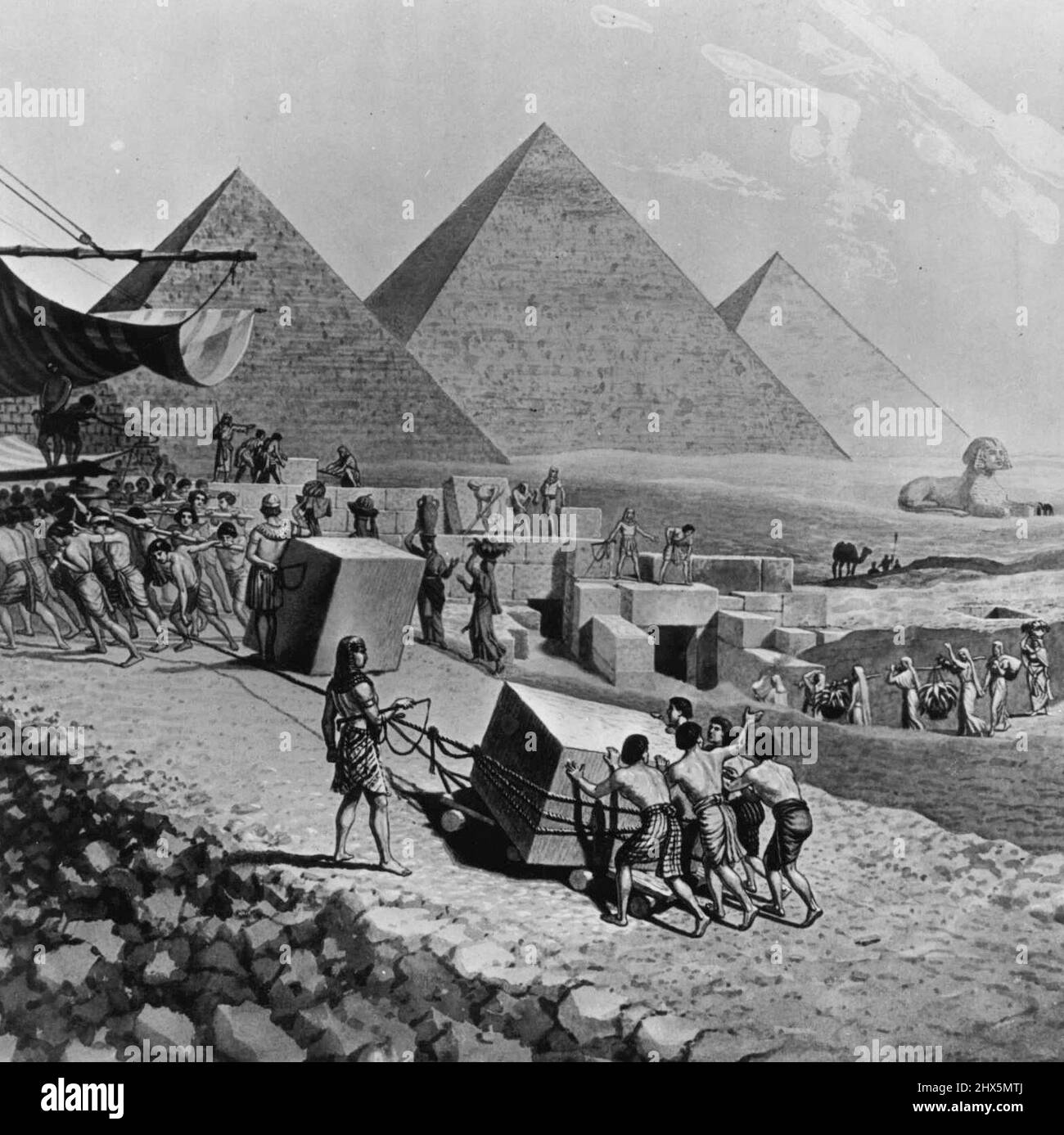 The Seven Wonders Of The World - Joseph Boggs Beale, American artist (1841-1926), here pictures his conception of the Seven Wonders of the Ancient World. Of these wonders, only the Pyramids of Egypt have survived. These drawings are from the modern Galleries in Philadelphia from whom the (name of paper) has obtained exclusive reproduction rights. The Great Pyramid Of Gizeh (center) is the largest of the Egyptian pyramids which comprise the only remaining Wonder of the Ancient World. At the right in this picture is the Sphinx, a crouching lion with a human head, cut from a single huge block of Stock Photo