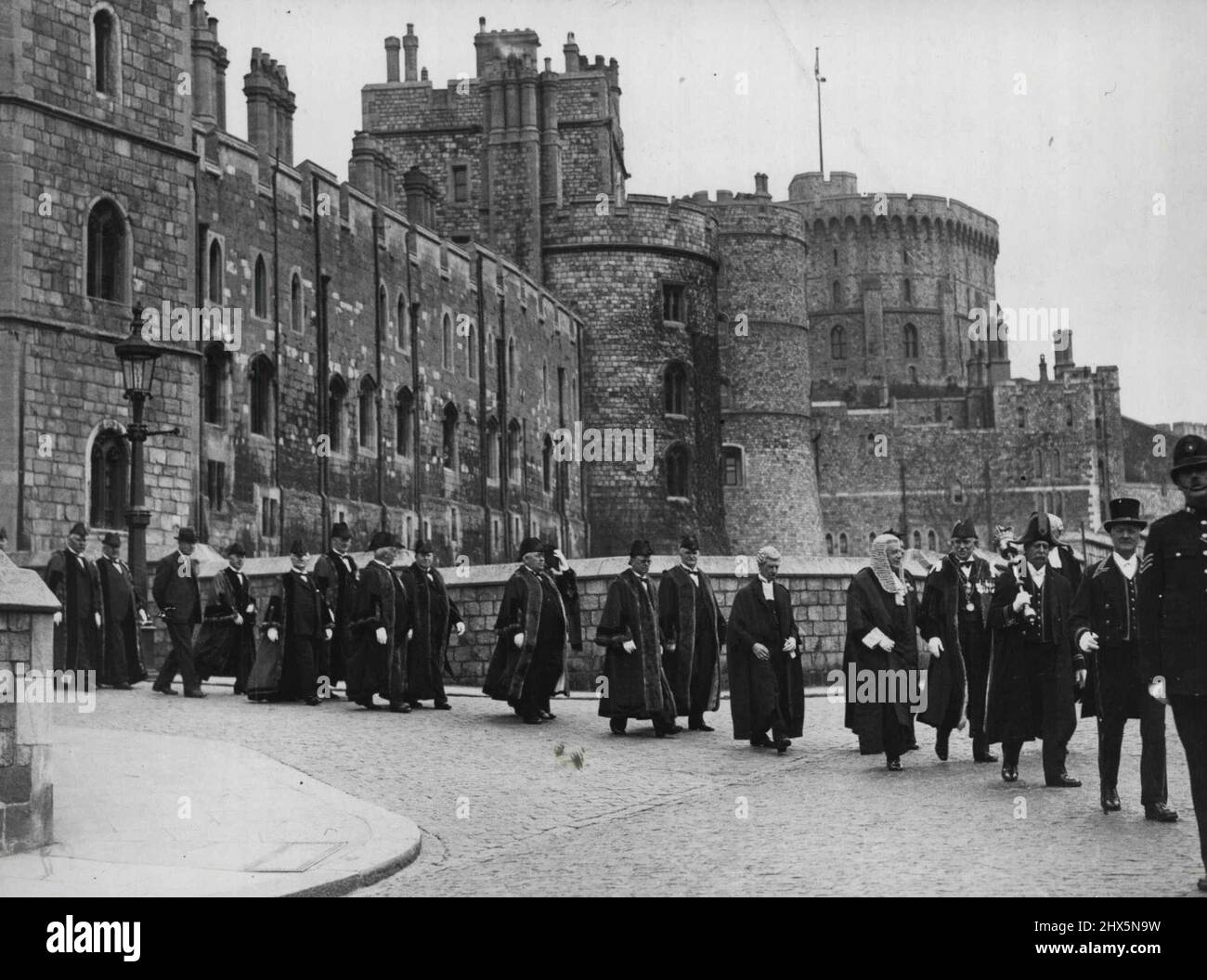 The mayor and corporation of Windsor And the dean and Canons of St. George's chapel Windsor Castle presented addresses to H.M. the king at the castle. This was the King's first function of an official nature at Windsor castle since his accession. The Mayor and Corporation in procession leaving Windsor Castle after the ceremony. January 15, 1936. (Photo by Sport & General Press Agency Limited). Stock Photo