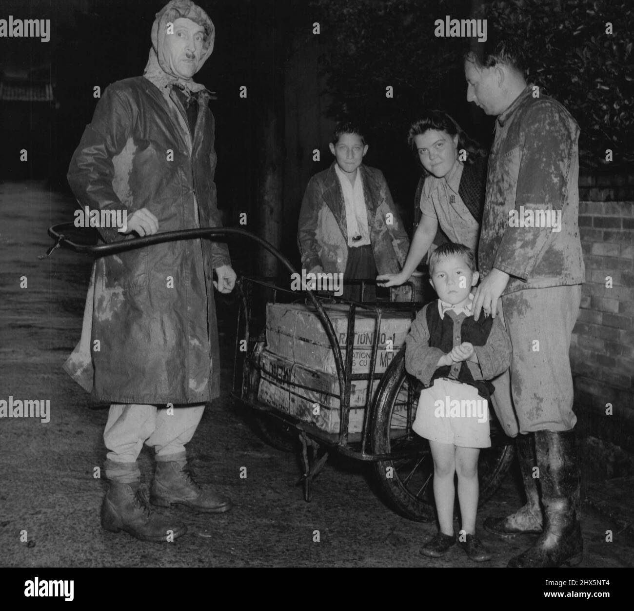 Food Ration -- The family pictured above has just received it food ...