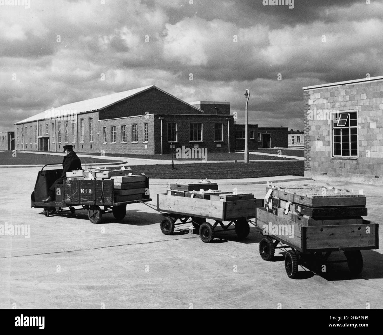 Ministry Of National Insurance Central Office: Record Branch - Bulk Transit -- To cover the 64 acre site, electric trailers are used for all material too big for despatch by the pneumatic tube service. July 12, 1951. (Photo by British Official Photograph). Stock Photo