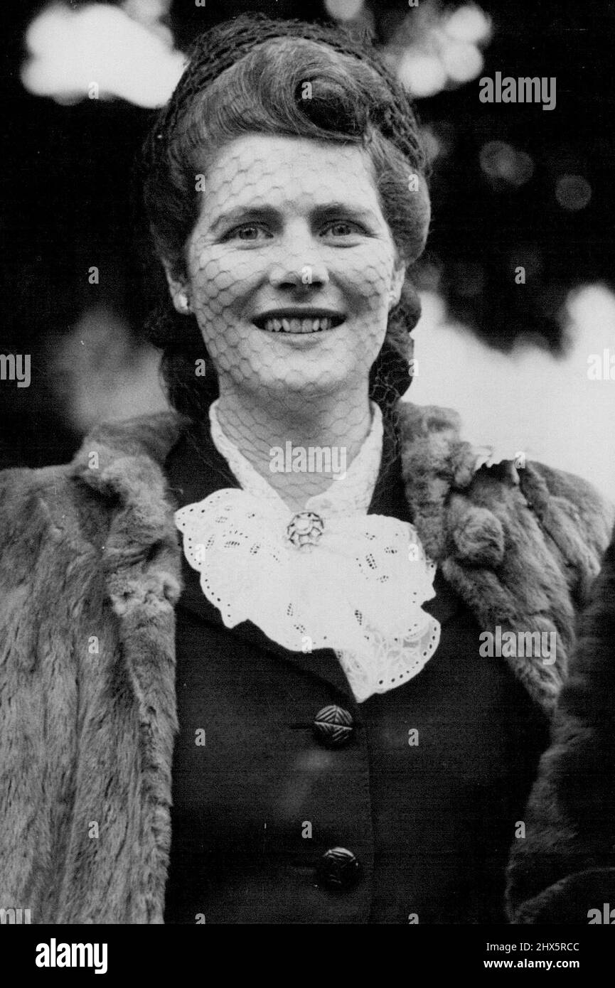 Mary Churchill Engaged - The first picture of Miss Mary Churchill since her engagement was announced, attending the wedding of Lord Woolton's son. Miss Mary Churchill, youngest daughter of Mr. and Mrs. Winston Churchill is engaged to be married to Capt. Christopher Soames, Coldstream Guards, whom she met in Paris only a month age. The engagement was announced this morning. Miss Churchill is 24 and her fiance 26 years old. November 09, 1946. Stock Photo