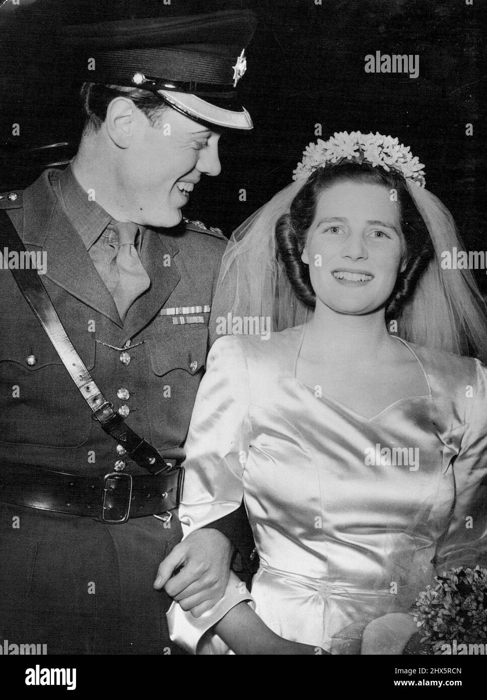Miss Mary Churchill weds captain Christopher Soames at St. Margaret's Church, Westminster, in London. The bride and bridegroom arriving at the Dorchester Hotel, in London, for the wedding reception, after the ceremony at St. Margaret's Church, Westminster. Mr. Winston Churchill, Britain's war-time Leader, led his youngest daughter Miss Mary Churchill, to the altar at St. Margaret's Church, Westminster, London, when she was married to Captain Christopher Soames of the Coldstream Guards, the only son of Captain Arthur Granville Soames, and the Hon. Mrs. Charles Rhys. February 11, 1947. Stock Photo