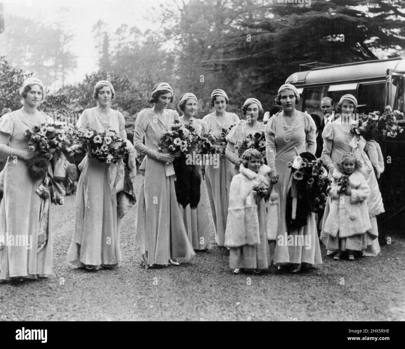 The wedding of Lady May Cambridge and Capt. Abel ***** Balcombe, Sussex. In the bridal retinue were ***** All wore soft powder-blue velvet, and the children ***** picture at Brantridge Park after the wedding are ***** fur coats. December 16, 1931. Stock Photo