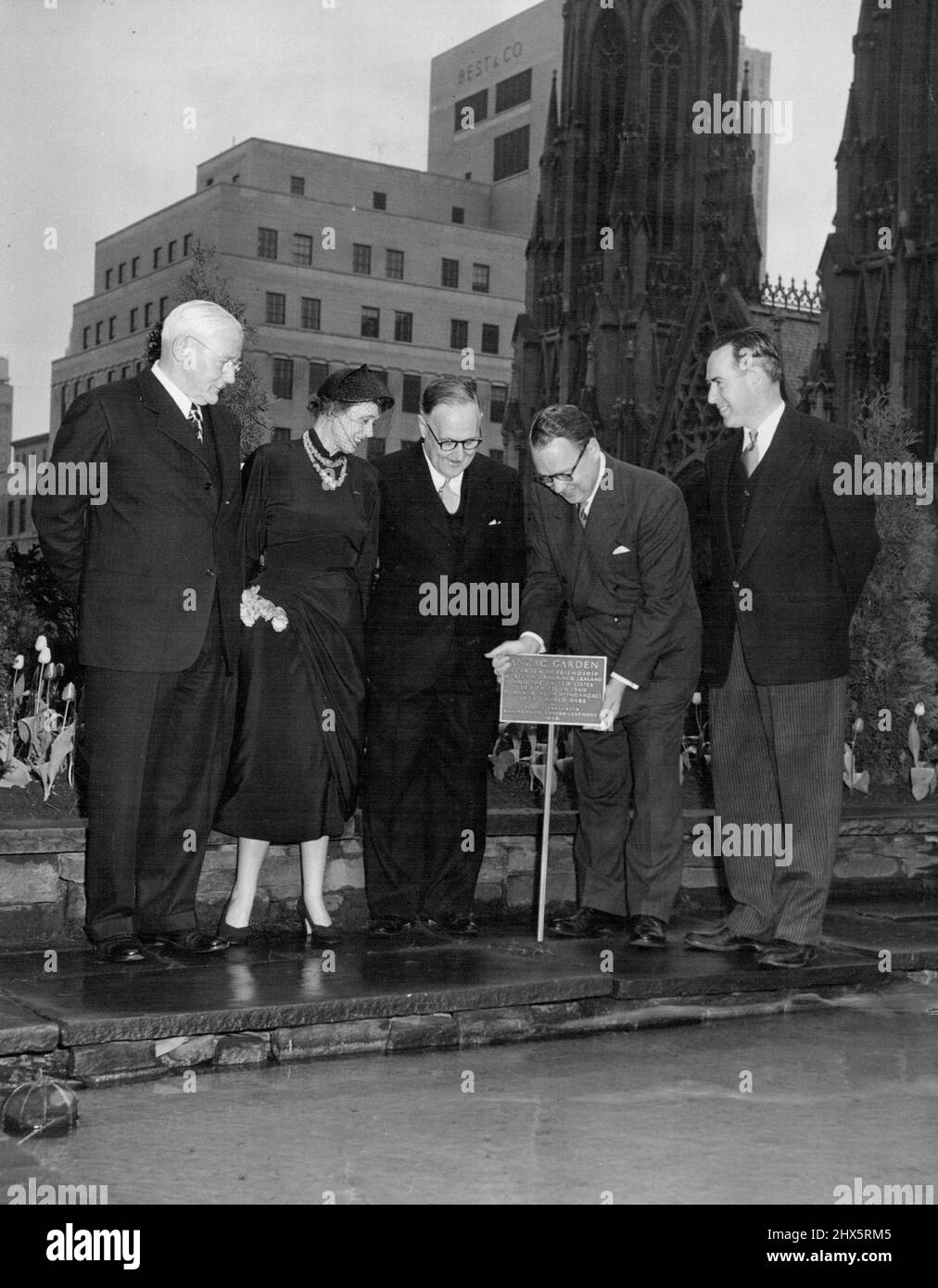 Celebrating the 10th anniversary of the dedication of the Anzac Garden atop the British Empire Building in Rockefeller Center on Sunday, April 23, 1950, are: (L. to r.) Lt. Gen. E.K. Smart, Australian Consul General; Miss Nola Luxford, wartime President of the Anzac Club of N.Y.; The Honorable Norman Makin, Australian Ambassador to the U.S.; G.S. Eyssell, Executive Vice President of Rockefeller Center, Inc., and Mr. D.W. Woodward, New Zealand Consul General. During the ceremony a bronze plaque to be placed in the garden was presented to Rockefeller Center. The inscription on the plaque is as Stock Photo