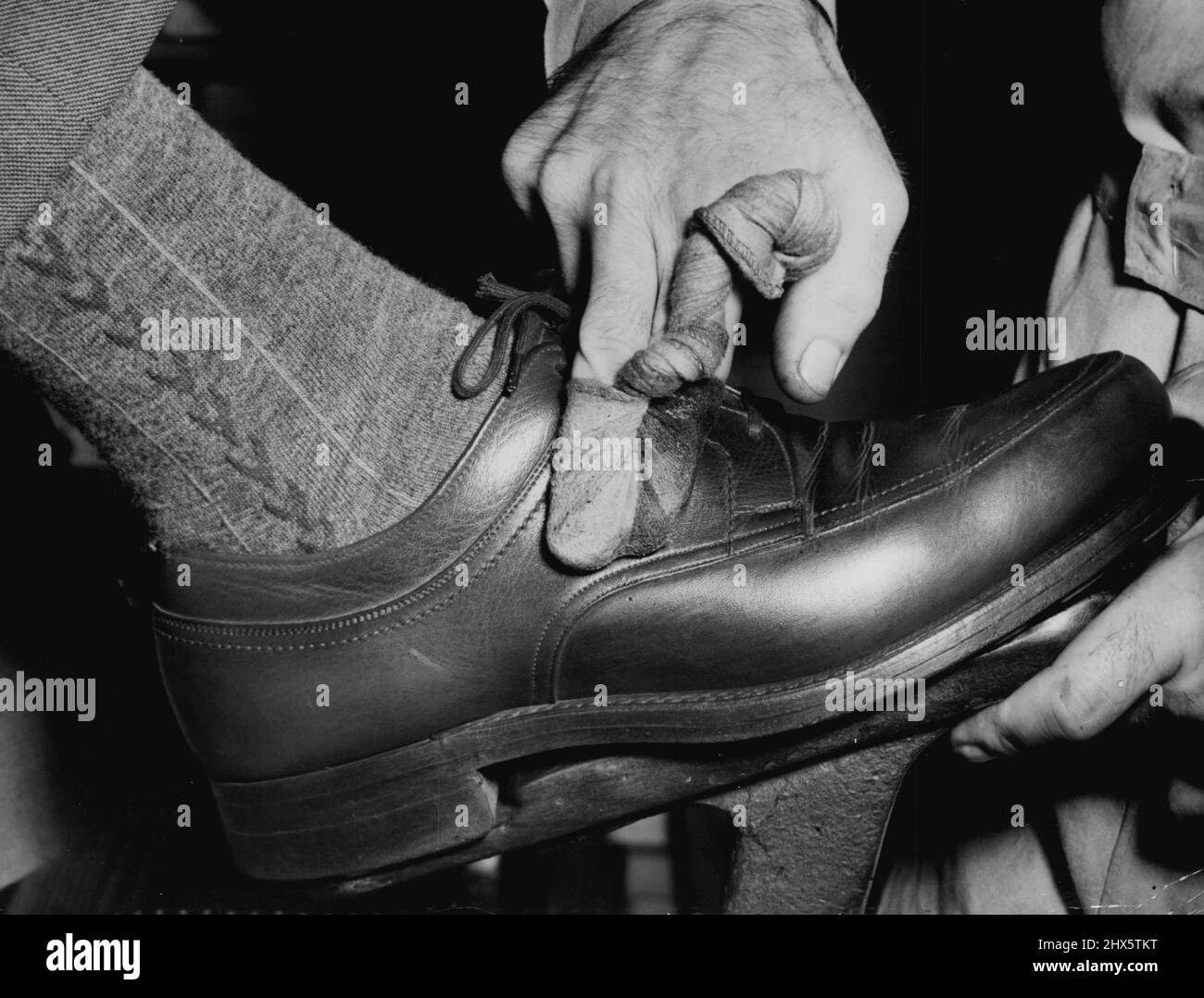Smooth roads, socks over shoes Date: 31 January 1950 Keywords: SHOES, socks  Stock Photo - Alamy