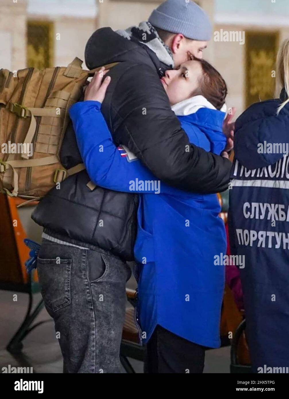 Irpin, Ukraine. 09th Mar, 2022. People bid goodbye to each other with a hug in Irpin, Kyiv, Ukraine, on Wednesday March 9, 2022. Photo by Ukrainian State Emergency Service/UPI Credit: UPI/Alamy Live News Stock Photo