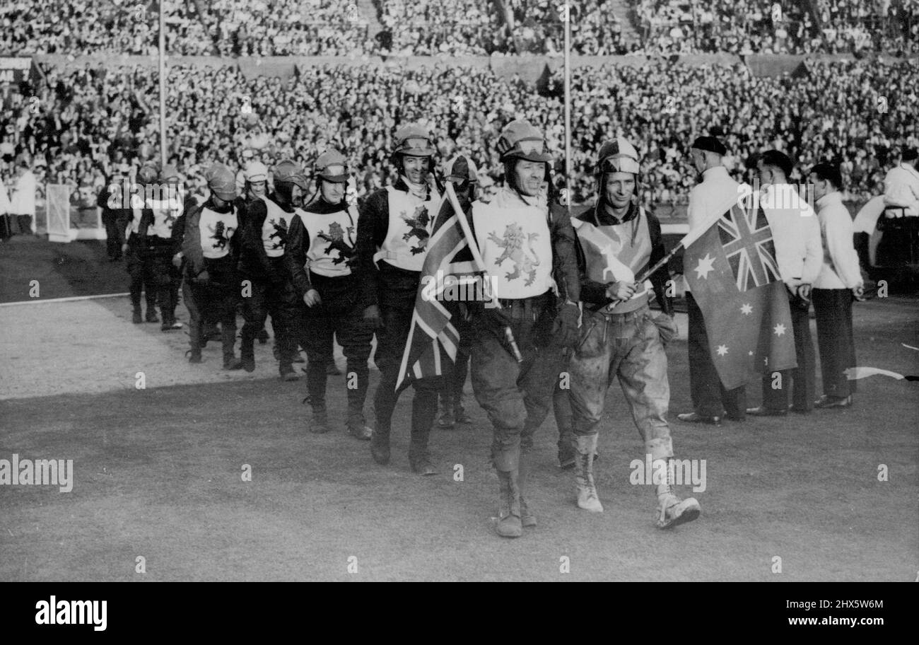 Australia Wins Final Speedway Test. Jack Parker (England) and Max Grosskreutz (Australia) leading their teams into the arena fore opening ceremony. Australia won the final Speedway Test against England by 57 points to 49, at the. Wembley Stadium; London. England have won the 'rubber' however, by two matches to one. August 14, 1947. (Photo by Sport & General Press Agency, Limited). Stock Photo