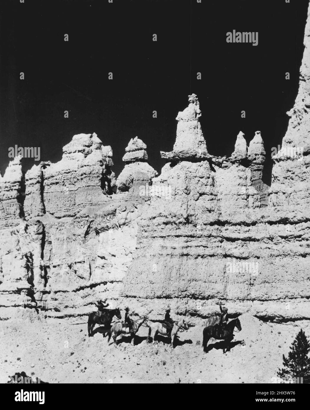 A Stone image of Queen Victoria seems to hold court atop the rocks of Southern Utah's Bryce Canyon, where through the ages erosion is Gradually carving out a vast silent city which will eventually be destroyed by the same forces. August 29, 1952. (Photo by United Press). Stock Photo