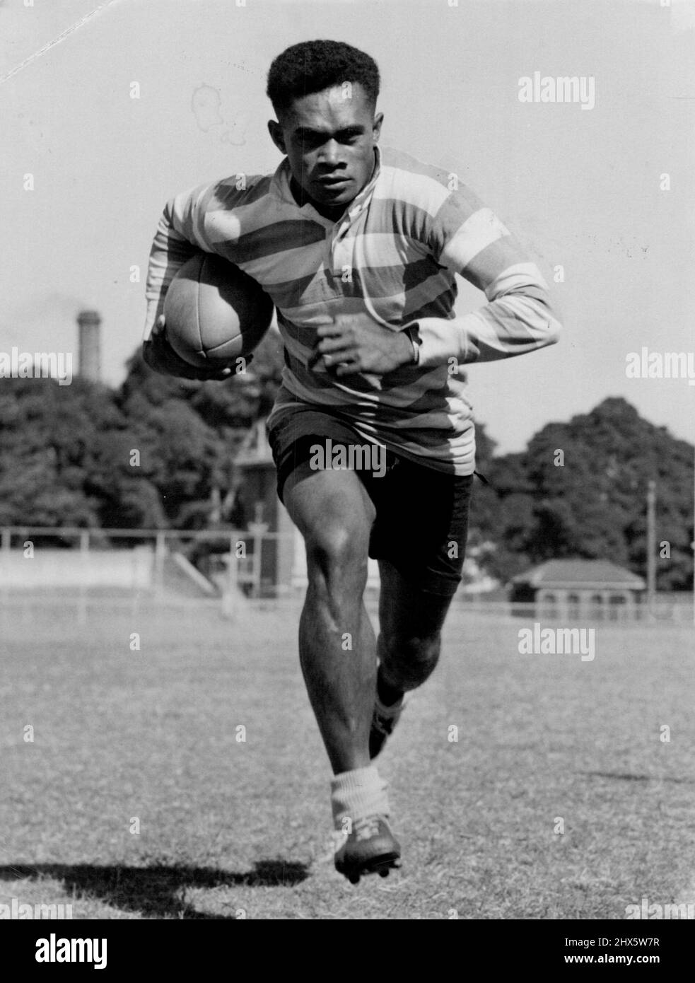 Fiji R. U. Star for St. George -- Orisi Dawai, captain of the 1954 Fijian Rugby Union team which toured Australia, may play for St. George Rugby League club this season. Dawai has told the St. George club he is willing to pay his own fare to Australia. He has already obtained a visa to leave Fiji, and the St. George club is trying to arrange a landing permit for him. Dawai, who plays both centre and wing, was an outstanding attraction during the 1954 tour. May 13, 1954. Stock Photo