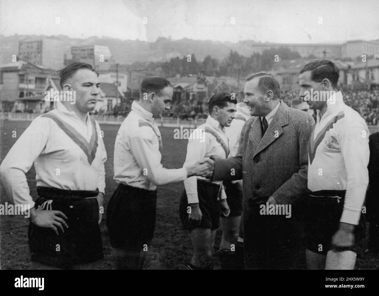 English Rugby League centre Bryn Knoweldon, who is reported to have signed a contract to play for South Sydney Club next season is introduced to NZ Governor General Sir Bernard Freyberg, by Ernest Ward before England beat the Maoris at Wellington. George Curran is on the left, and the other Englishman in the picture is half-back Dai Jenkins. August 11, 1946. Stock Photo