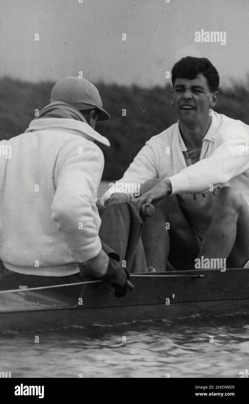 All-Out Effort --As Cambridge University stroke A.K. Muirhead (Glenalmond and Lady Margaret) puts his twelve stones behind practice with his crew on the Ouse at Ely, Cambridgeshire, in preparation for the inter-Varsity Boat Race against Oxford on March 26. Cox is G.T. Harris (High Wycombe R.G.S. and Jesus). February 25, 1955. (Photo by Reuterphoto). Stock Photo