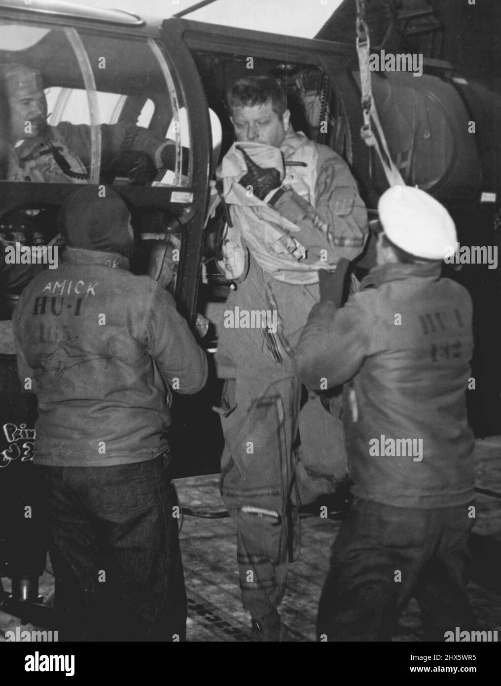 LT. (jg). W.C Windsor of Tyler, Tox., and former Dallas Weekend Warrior  climbs from a helicopter after being rescued from behind enemy lines in  North Korea. LT (jg). Windsor was making his