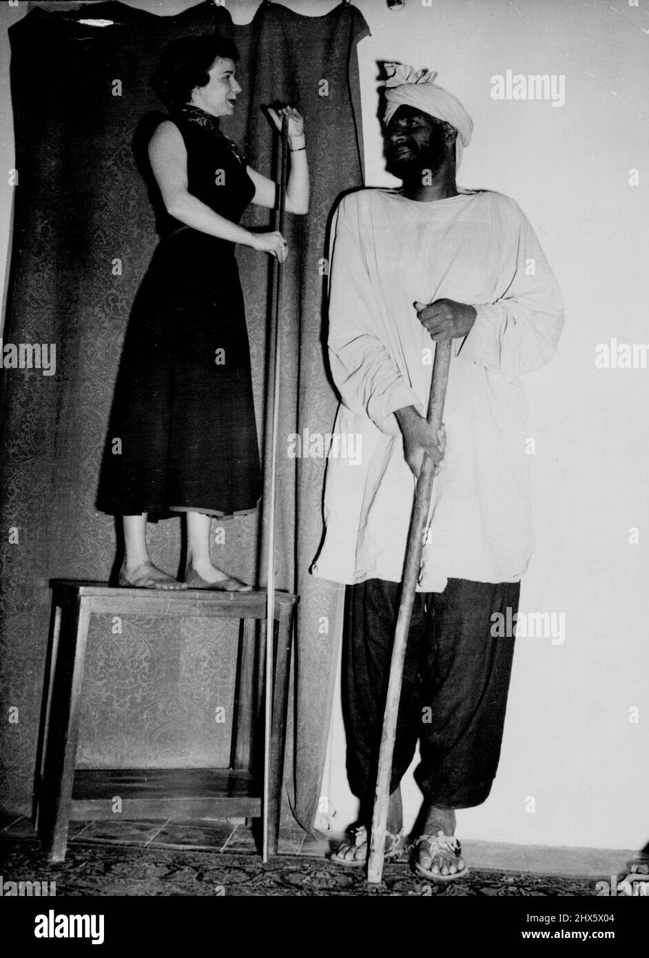 Height comparison tall Black and White Stock Photos & Images - Alamy