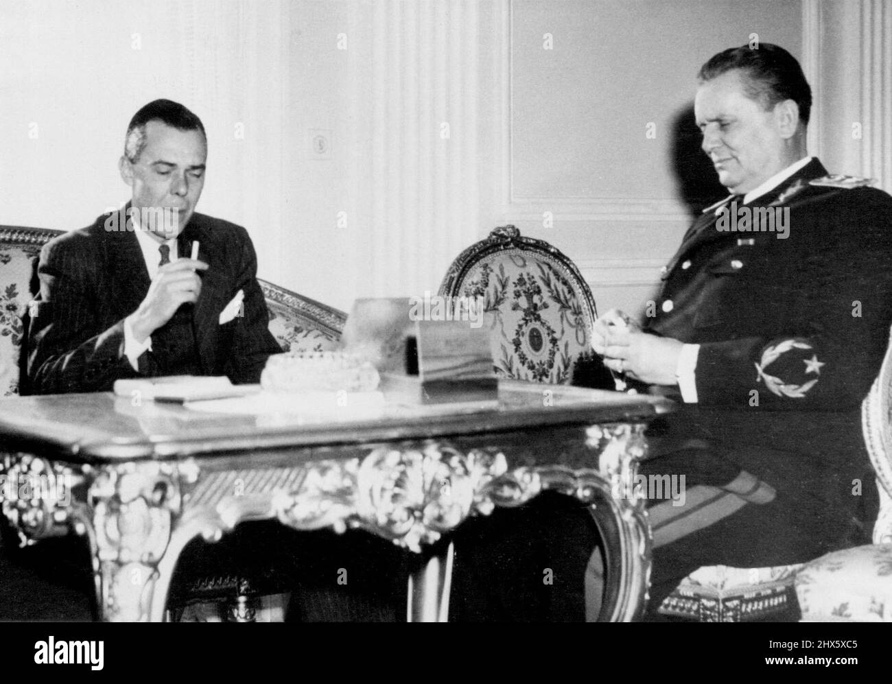 Tito Receives New U.S. EnvoyYugoslav premier Marshal Josip Broz Tito (right) receives George Allen, new United States ambassador to Yugoslavia in Belgrade, Jan. 26. According to ambassador Allen the two had a long discussion on the'general field of American-Yugoslav relations' and the conversation was 'marked by friendliness and frankness on both sides.' January 2, 1950. (Photo by Associated Press Photo). Stock Photo
