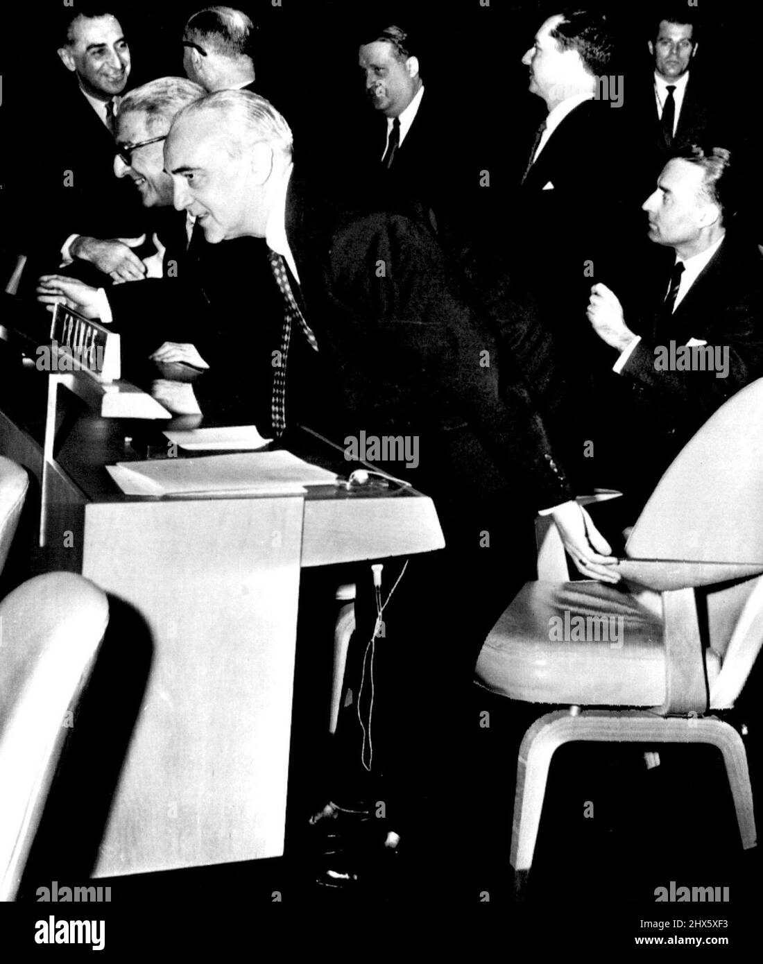 France Ends Boycott - Jules Moch, left and Herve Alphand, representatives to United Nations from France, take their seats in the General Assembly here today, thus ending two-months- old boycott over the Algerian issue. Their return coincided with the fall of Premier Edgar Faure's government in Paris. November 29, 1955. (Photo by AP Wirephoto). Stock Photo