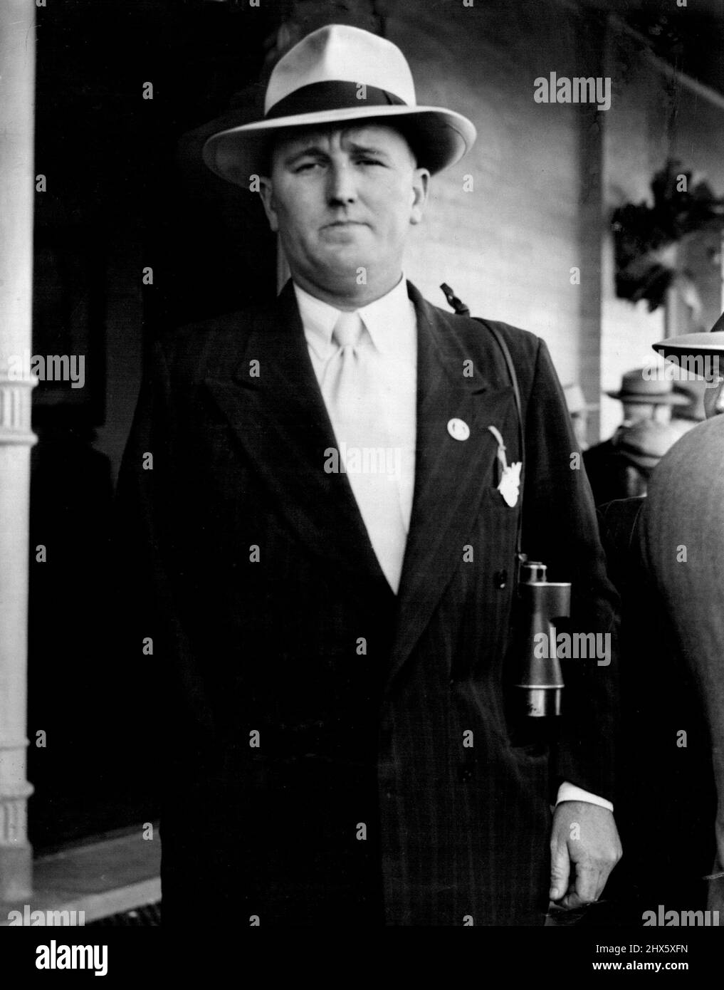 The Trainer. Fred Allsop watches anxiously as High Law is unsaddled. Allsop most his right arm a few months ago in a car smash when returning from Hawkes bury races. September 14, 1952. Stock Photo