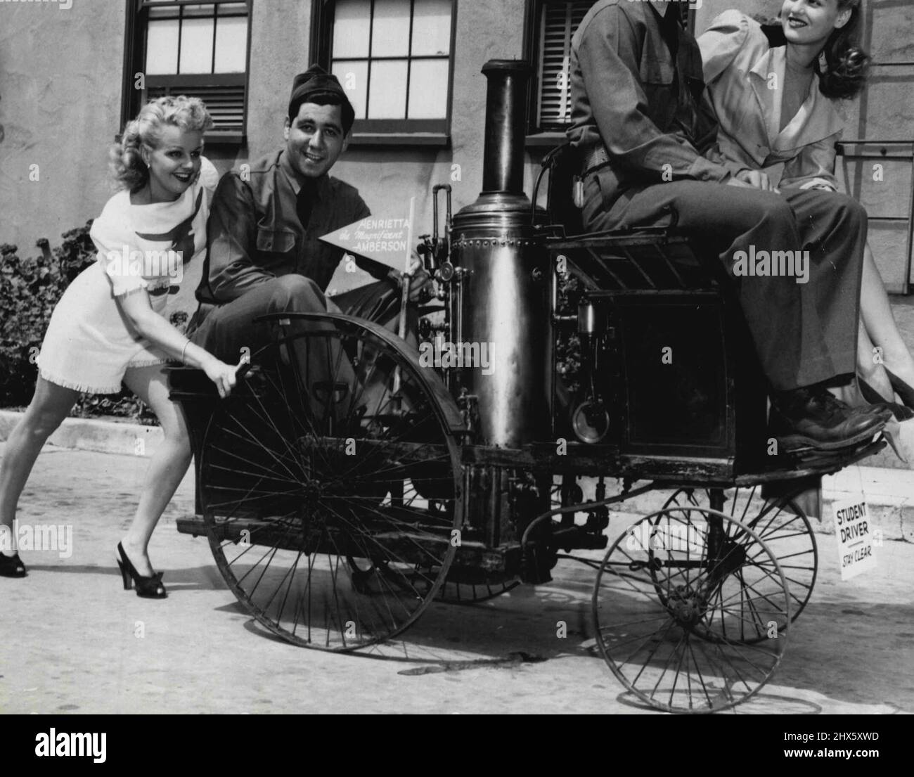 Henrietta, the horseless carriage, wasn't in Hollywood long before she had  a date. Here she is headed for the Brown Derby with soldiers and starlets  Ariel Heath (L) and Julie Warren. (Henrietta