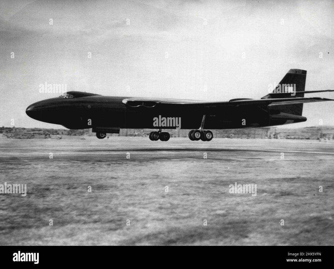 Britain's First Swept Wing Jet Bomber -- Two feet to go and the first ***** will be safely accomplished. December 1, 1953.;Britain's First Swept Wing Jet Bomber -- Two feet to go and the first ***** will be safely accomplished. Stock Photo