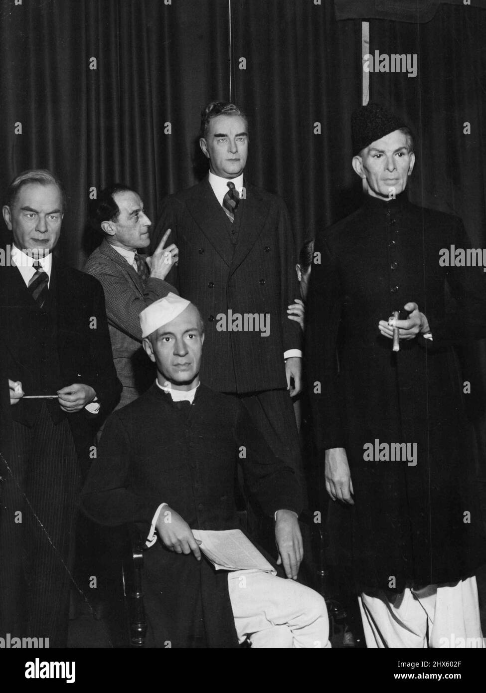 Madame Tussaud's wax works London, Ben Chipley ex PM of Aust. has been removed and has been re/laced by Bob Meyies, after models are removed they are then melted down and wax is re-used to construct ***** models. Around R. G. Menzies L to R: Mc Kenzies King, ex P M of Canada, Nehru, PM of India, R. Menzies of Aust. Mohammed Ali, Gov.-Gen. of Pakistan. January 18, 1950.;Madame Tussaud's wax works London, Ben Chipley ex PM of Aust. has been removed and has been re/laced by Bob Meyies, after mode Stock Photo