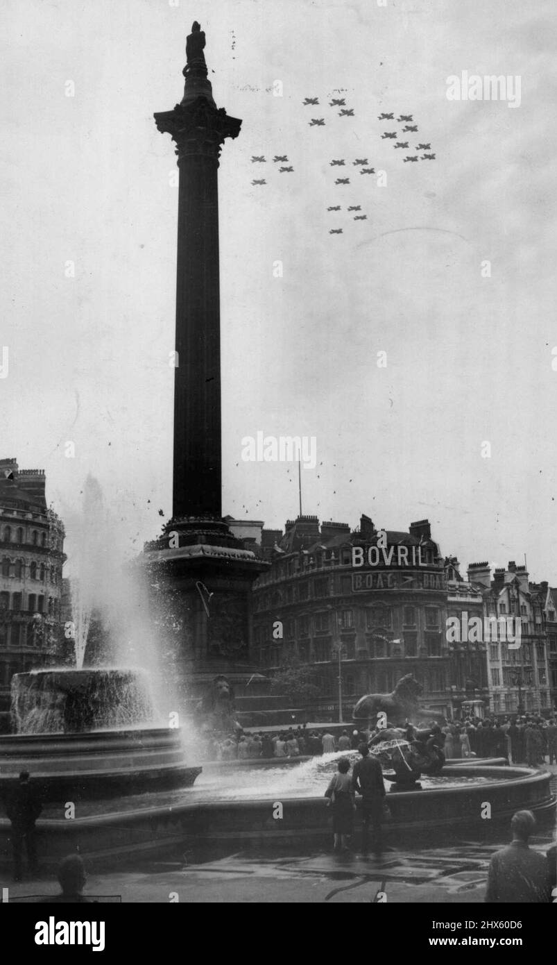 Jets In Battle Of Britain Fly-Past. Nelson's Column in Trafalgar Square dominates the picture as Canberra jet aircraft fly over during the annual Battle of Britain fly-past, commemorating the exploits of 'The Few'. This year a force of 252 jets took part - the largest - ever force of jets seen over London. September 15, 1953. (Photo by United Press Photo).;Jets In Battle Of Britain Fly-Past. Nelson's Column in Trafalgar Square dominates the picture as Canberra jet aircraft fly over during the an Stock Photo