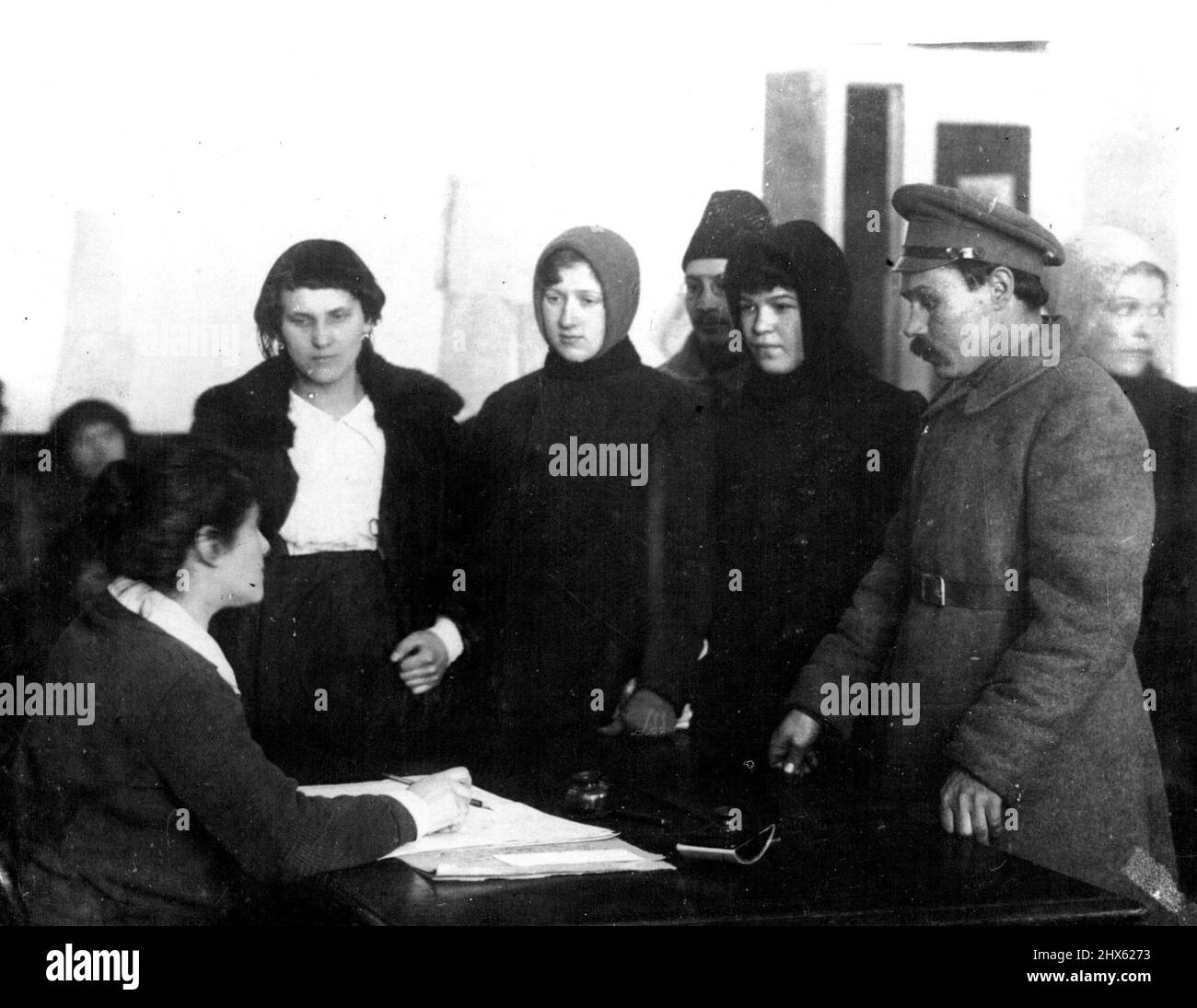 Scenes In Petrograd During The German Advance. Wives of the workmen enrolling as nurses for the front. June 11, 1918. (Photo by Daily Mirror).;Scenes In Petrograd During The German Advance. Wives of the workmen enrolling as nurses for the front. Stock Photo