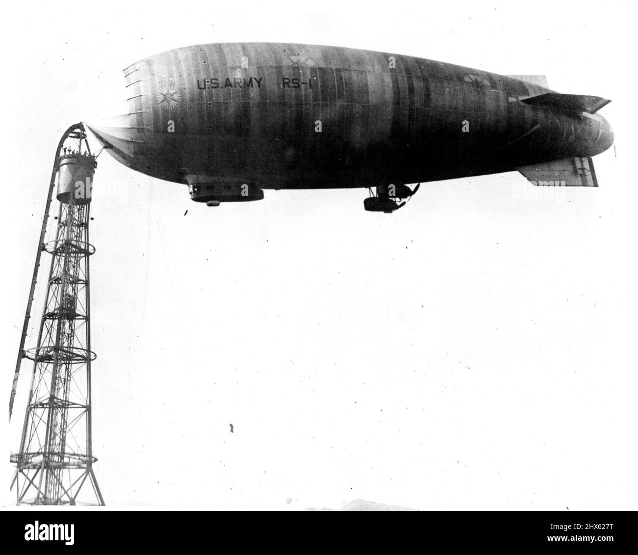 U.S. Army To Junk Dirigible Rs - 1 -- The Army dirigible R.S.1. once the pride of the Army and the largest semi rigid dirigible in the world, is to be junked. The craft was built at a cost of $600,000 - an experiment in aeronautics for which a St. Louis Junk dealer is to pay $900. August 3, 1931. (Photo by International Newreel Photo). ;U.S. Army To Junk Dirigible Rs - 1 -- The Army dirigible R.S.1. once the pride of the Army and the largest semi rigid dirigible in the world, is to be junked. Th Stock Photo