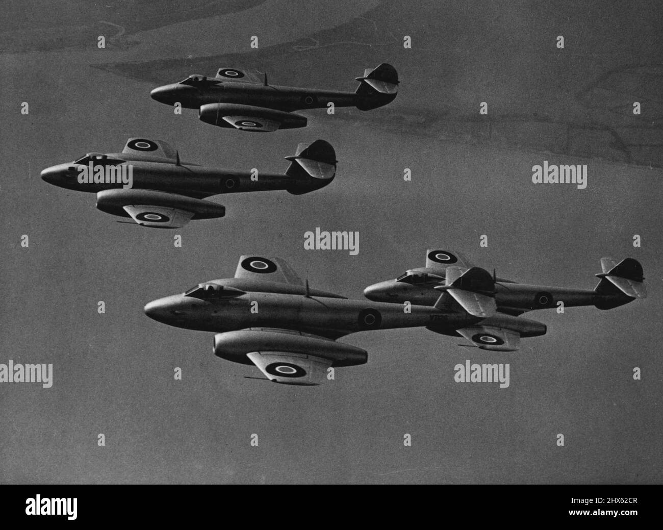 World's Fastest Fighter Group in the Air First photographs taken in the air of the ***** IV Meteor jet planes of the R.A.F. ***** group stationed at Horsham St. Faith, ***** Norwich, shows some of the planes on a training flight over the east coast of England. This group is equipped with the new mark IV Meteor jet planes which are fitted with the improved power units giving twice the power of the Meteor Mark III, and making them the fastest fighter group in operation in the world. April 28, 194 Stock Photo