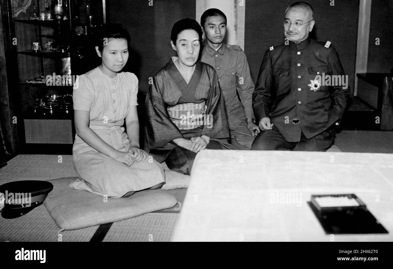 General Abe and Family......R to L: General Nobuyuki Abe, second son Nobuhiro, Mrs. Mitsuko and second daughter Tauneko. General Nobuyuki Abe, who was commanded lay His Majesty the Emperor organization of cabinet in succession to Baron Hiranuma, this evening is seen with his family at home. The picture was taken shortly after the General returned from Imperial Palace. August 28, 1939. (Photo by The Domei News Photos Service). Stock Photo