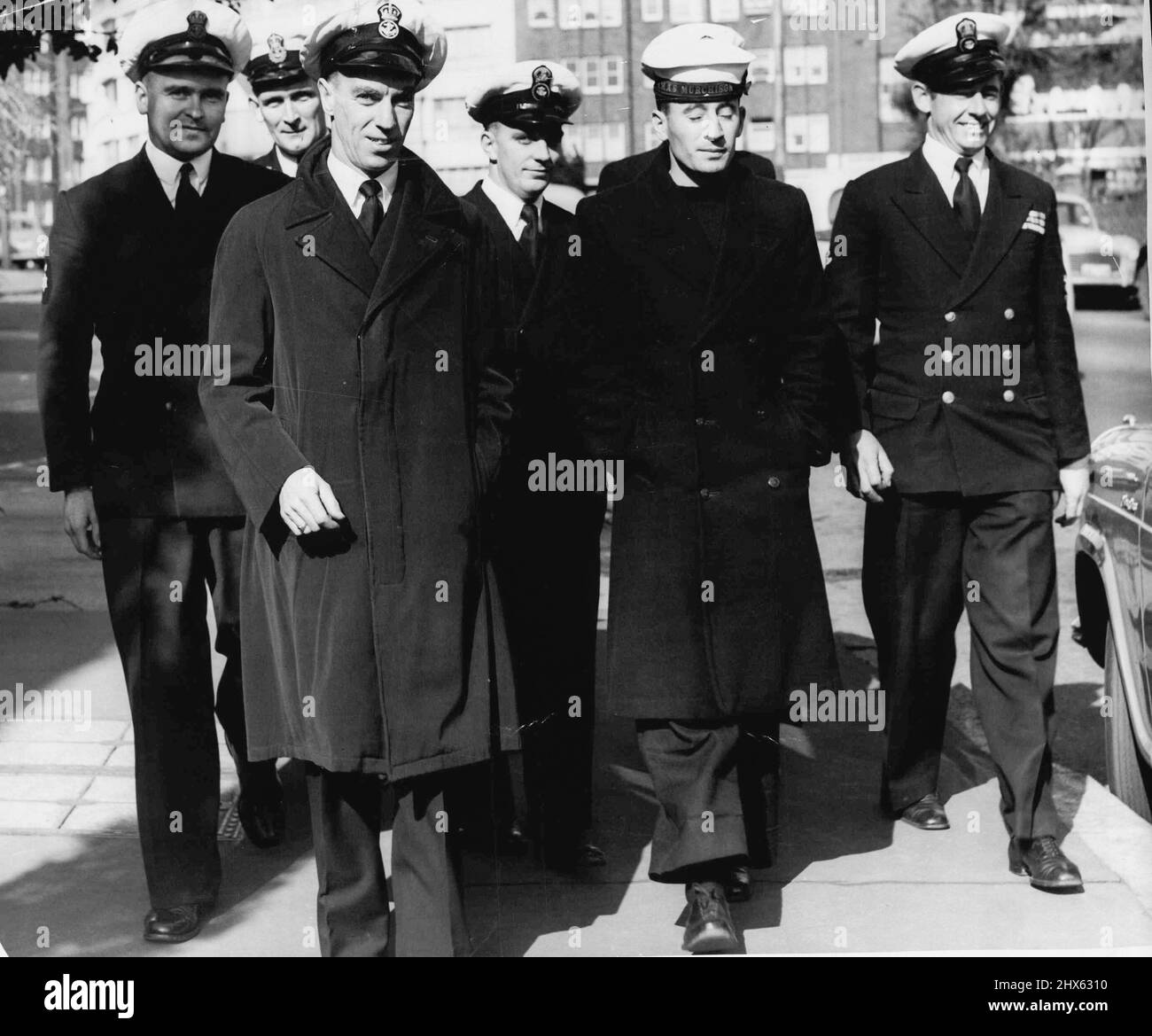 Navy courtmartial -- Some of the witnesses who have and have not yet appeared in the case, leave the navy H.Q. to go to lunch. L to R: L/S. R. Cocking, Chief M/E.R. Knowles, P.O. Steward E. Cox, P.O.M. (E) R. Sexton L/M (E) R. Ford and P.O.M. (E) J. Ward. June 30, 1955. (Photo by Wright/Fairfax Media). Stock Photo