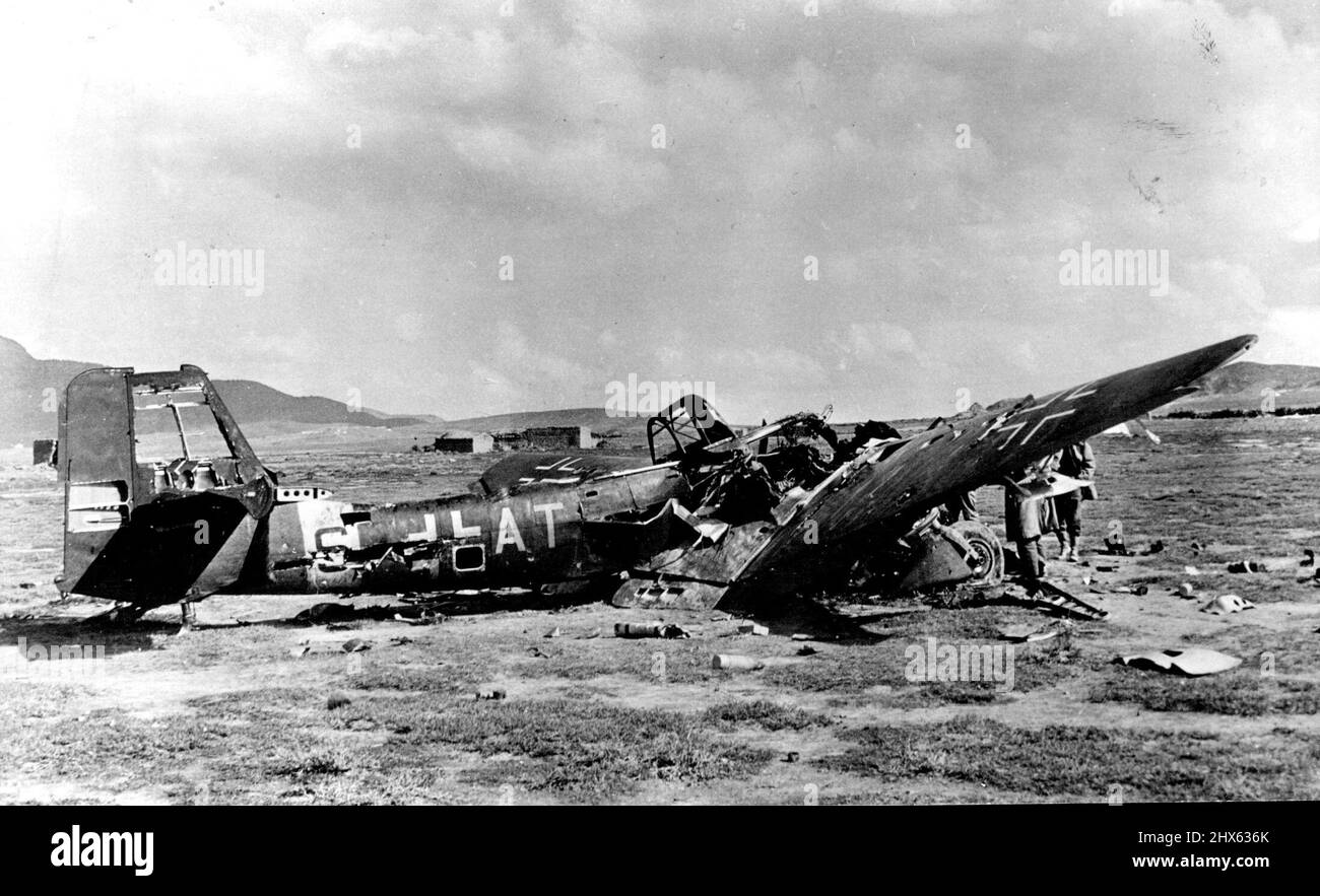 ***** Of A Nazi Dive Bomber In North Africa U.S. Army anti-aircraft guns shot down this Nazi JU87 Stuka dive bomber, before it could unload its bombs on American infantry in the opening phases of the U.S. drive in Central Tunisia. May 11, 1943. (Photo by United States Office of War Information). Stock Photo