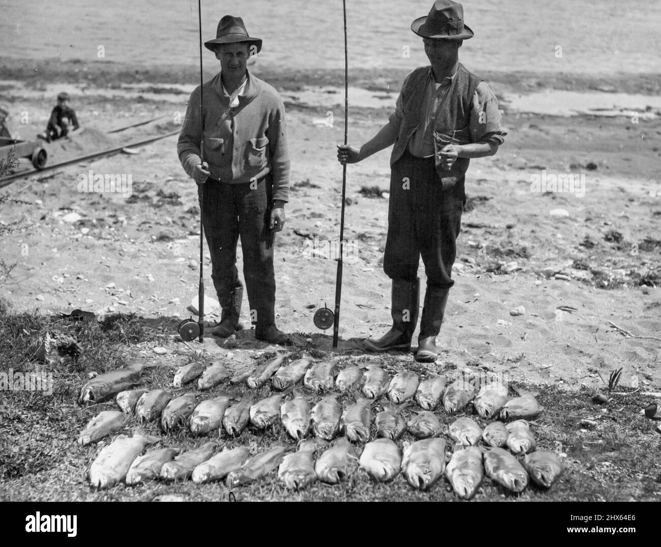 New Zealand's World Famous Trout Fishing. The new trout fishing season opened this week in the North Island of New Zealand. Anglers who were out during the weekend were very pleased with the size and condition of the fish. Prospects are described as being superior to those of several previous years. This photo was taken in the Taupo district. March 14, 1949. Stock Photo