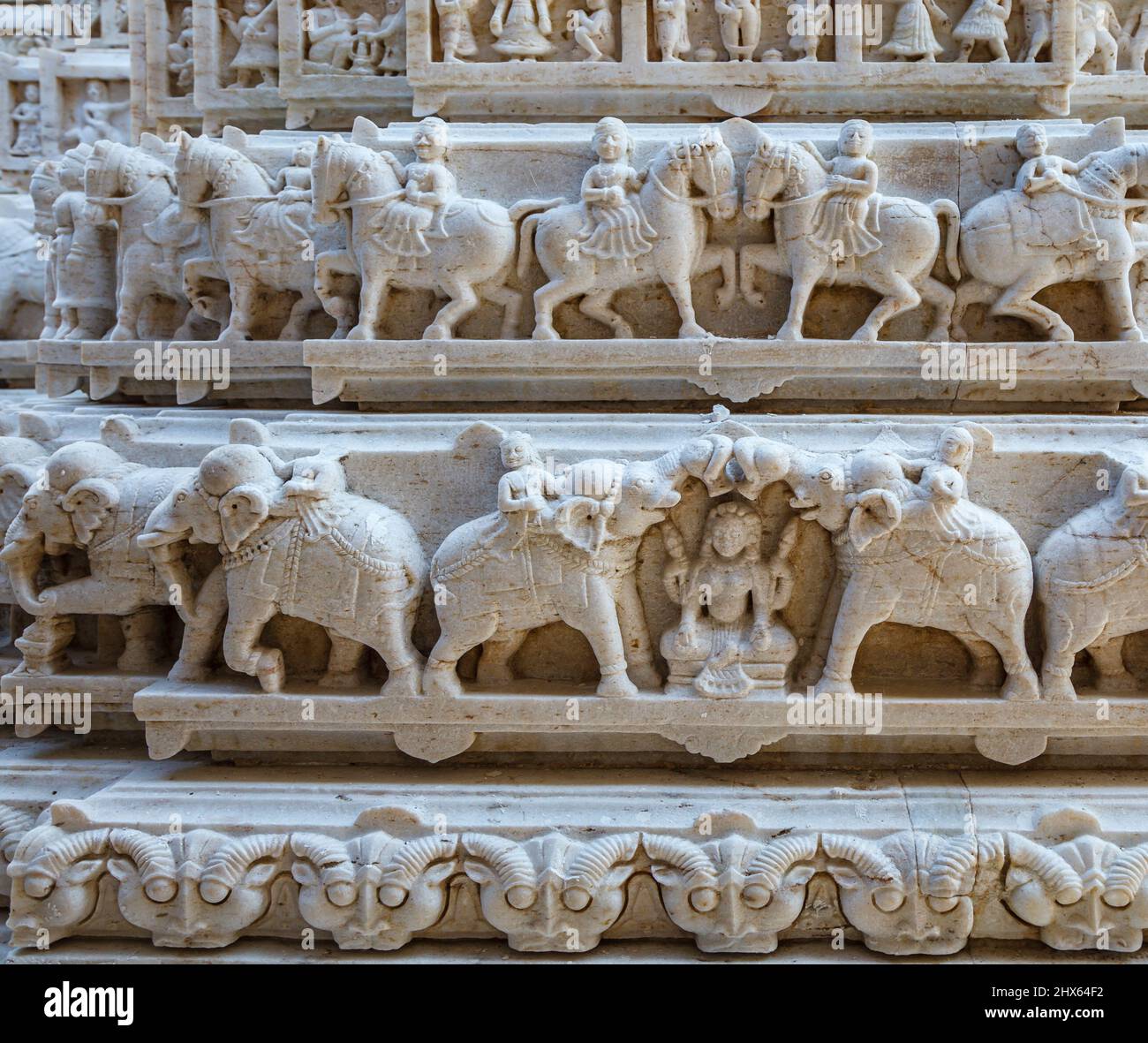 Sculptured frieze with horses and elephants at the Hindu Shree Jagat Sheromani Ji Temple, Udaipur, Indian state of Rajasthan, India Stock Photo