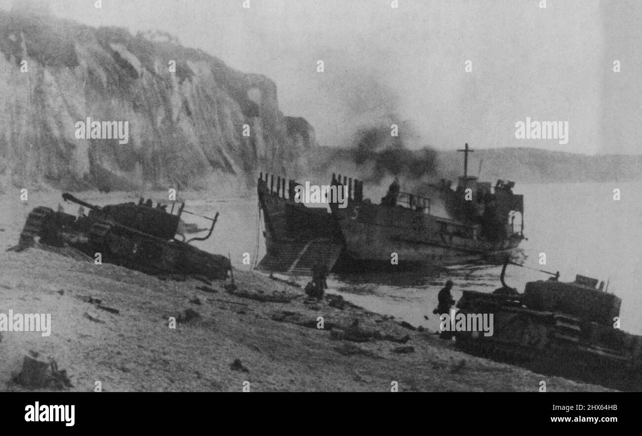 German Pictures of the Dieppe Raid Just Received in London. Some of the men killed on the beach of Dieppe. The special landing boat is seen burning in the background. September 07, 1942. (Photo by Keystone). Stock Photo