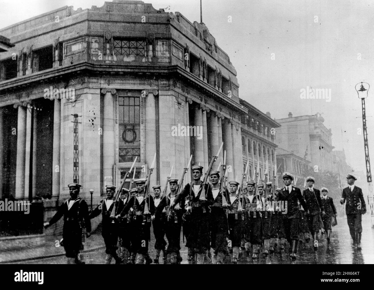 British bluejackets marching through the deserted streets of Hankow, after this important city had fallen to the Japanese on October 25th. November 17, 1938. (Photo by Keystone). Stock Photo