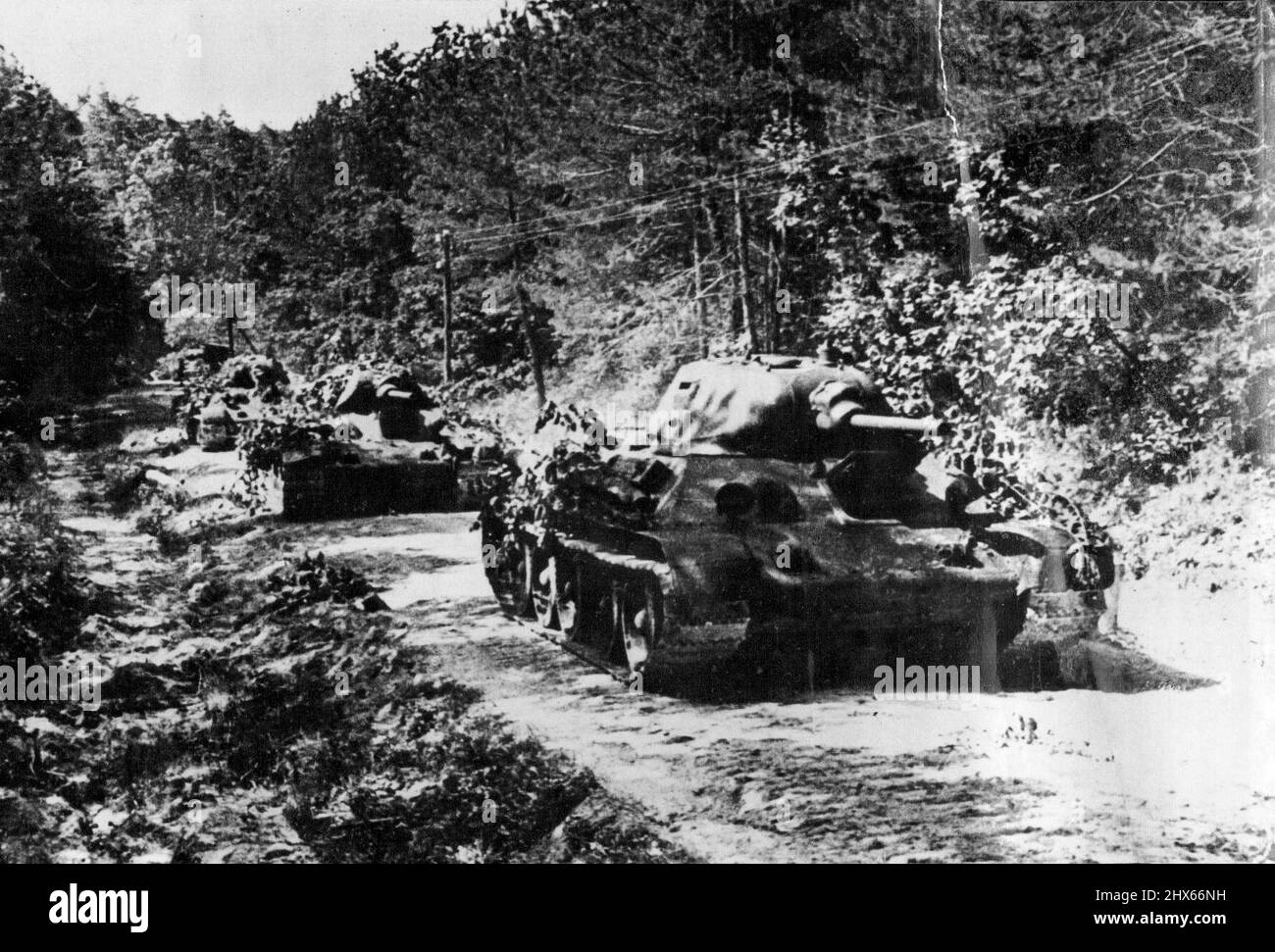 Tanks Of The Red Army Of The U.S.S.R. -- Red Army tanks moving up. The myth of invisibility with which the Germans surrounded their Panzer Divisions has been exploded on the battle-fields of Russia. Russian tanks have been more than holding their own, and very heavy casualties among the crack tank forces of Germany are reported from the recent fighting. September 9, 1941. Stock Photo