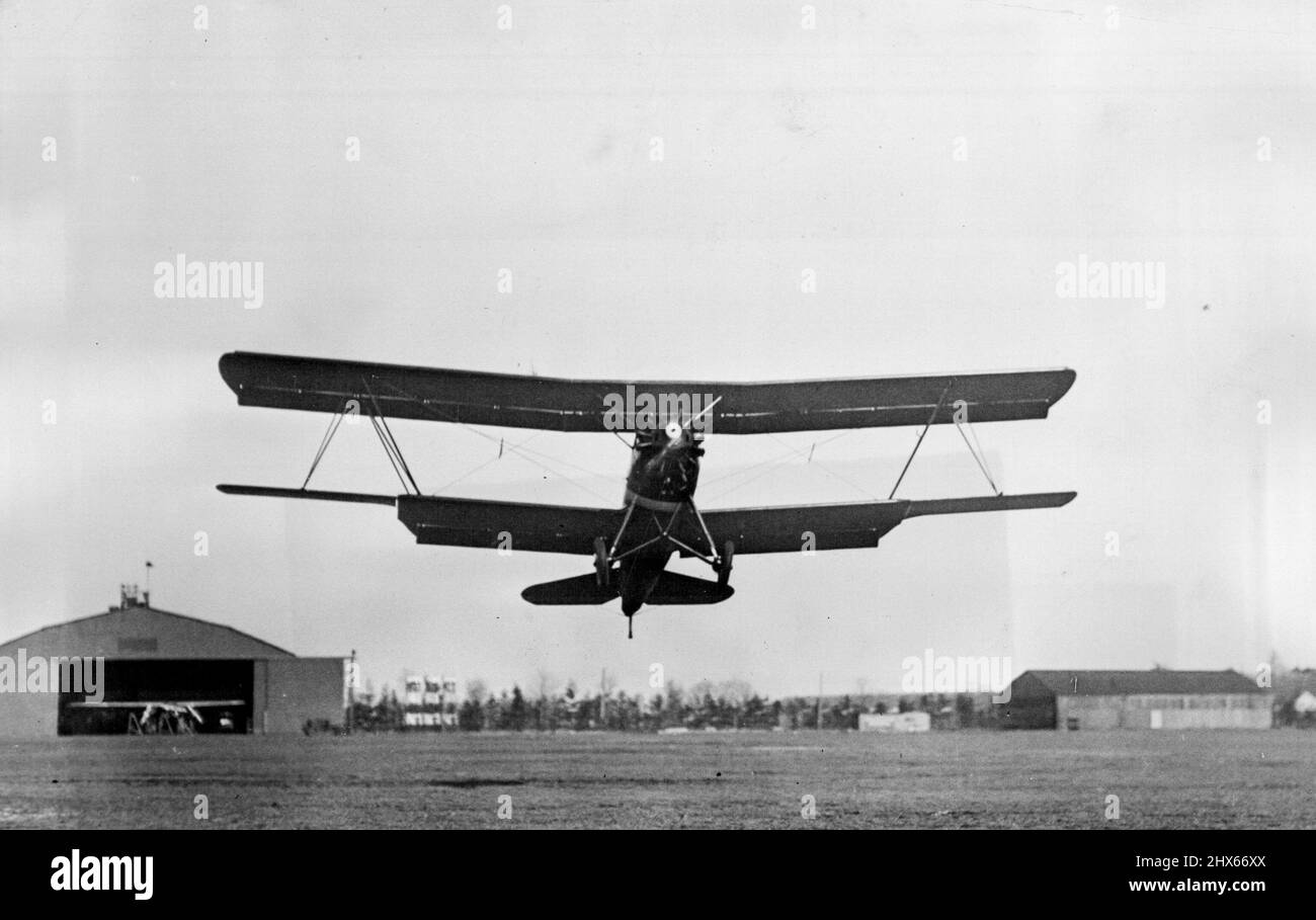 Curtiss Tanager Wins Guggenheim Trophy -- The Tanager in flight. Note slotted wings. Curtiss Tanager, built by the Curtiss Aeroplane and Motor Company, was awarded $100,000 prize, January 6th in the Guggenheim safe aircraft competition. Its floating ailerons eliminate dreaded Tailspin. January 6, 1930. (Photo by P & A Photos). Stock Photo