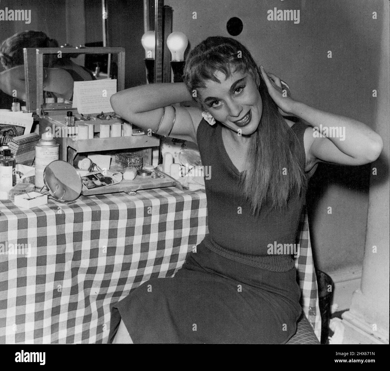Mai Zetterling opens in a new comedy -- Swedish born film star Mai Zetterling in her dressing room at the Opera House Manchester, after the first performance of the comedy 'Clerambrad' by Marcel Ayme. August 15, 1955. Stock Photo