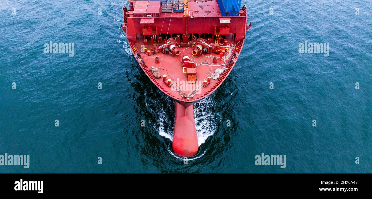 Aerial in front view of bow large cargo container ship, nose of vessel cargo ship. Stock Photo