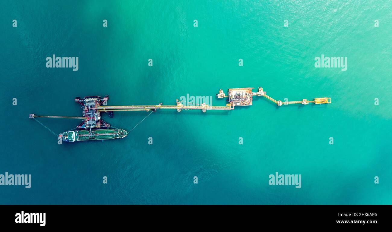 Aerial top view of  LPG gas tanker ship at crude oil terminal  for load or unload concept business logistic and transportation Stock Photo