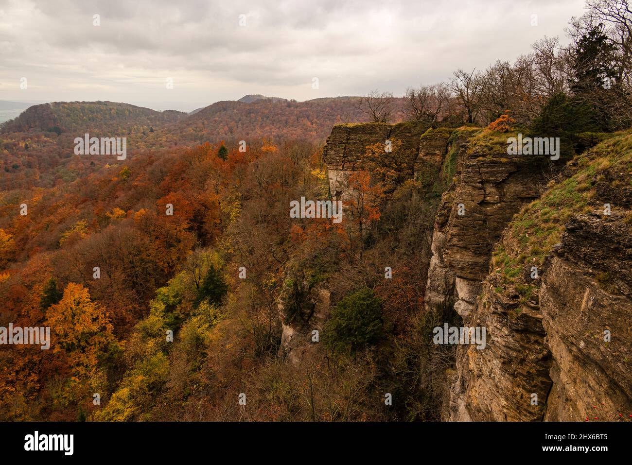 Beautiful wide view over an autumnal forest landscape, seen from the Hohenstein rock plateau, Süntel, Weser Uplands, Lower Saxony, Germany Stock Photo