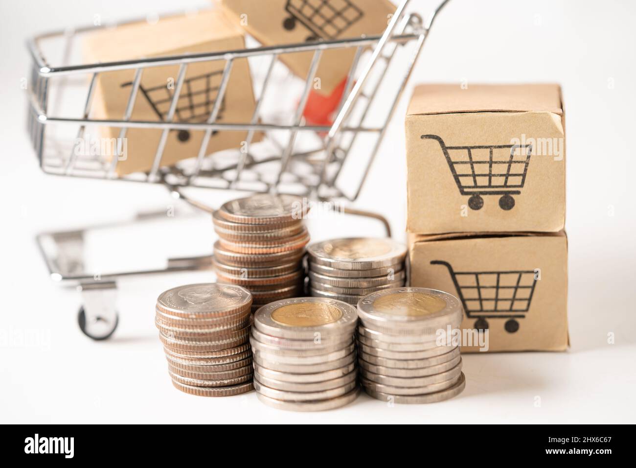 Shopping cart logo on box with coins. Banking Account, Investment Analytic research data economy, trading, Business import export online company conce Stock Photo
