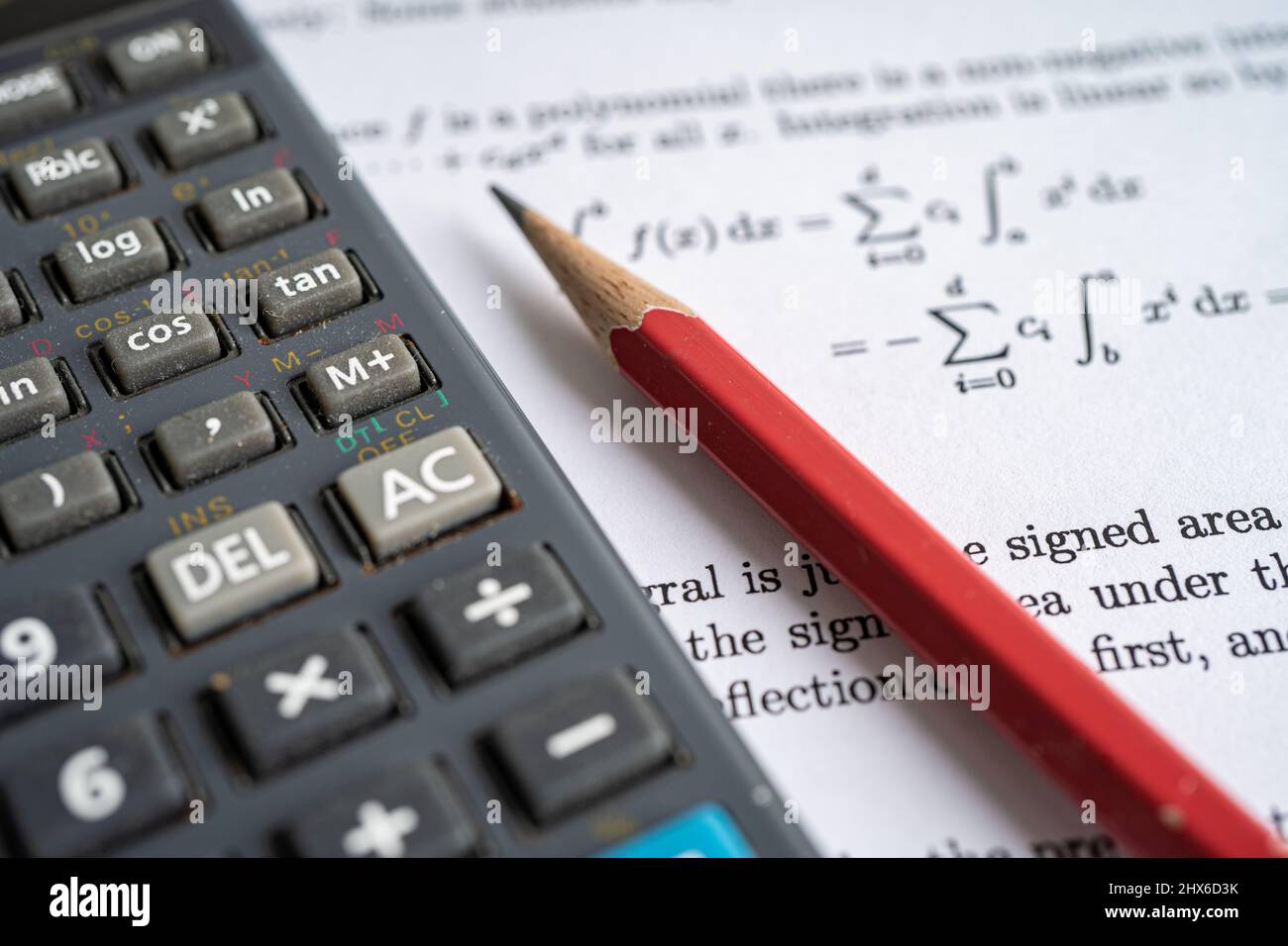 Pencil and calculator on mathematic formula exercise test paper in  education school Stock Photo - Alamy