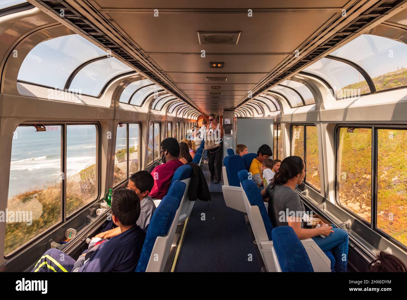 Central California/USA - April 2, 2016: Passengers admire the view from the California Coast Starlight passenger train. Stock Photo