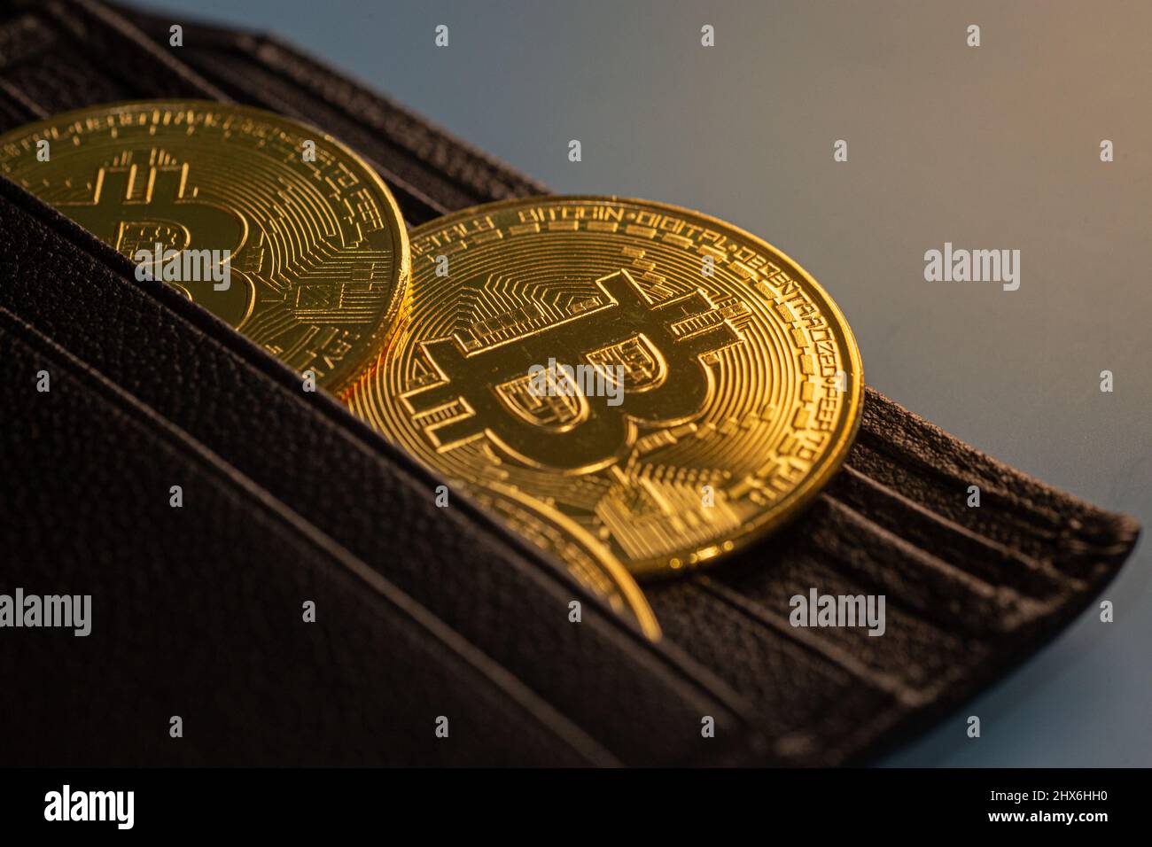 Golden Bitcoin token on a wallet. Digital currency. Cryptocurrency. Bitcoin  wallet Stock Photo - Alamy