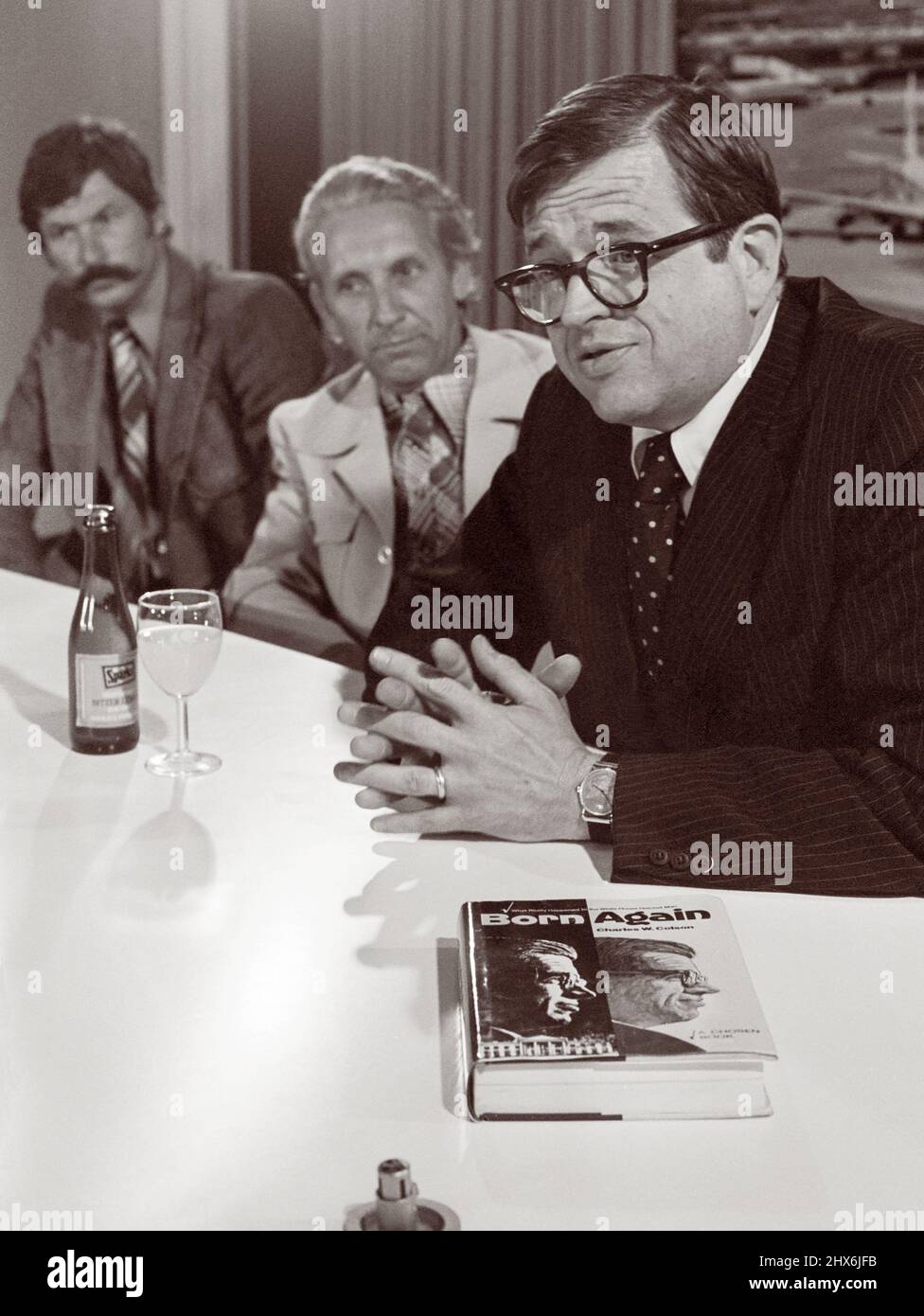 Charles 'Chuck' Colson (1931-2012) speaking at a press conference on June 13, 1976, at Amsterdam Airport Schiphol upon the publication of his autobiographical book, Born Again. Colson, a former political advisor to U.S. President Richard Nixon, was sentenced to prison for his role in the Watergate scandal. Before entering prison, Colson became an evangelical Christian and in 1976 founded Prison Fellowship, a Christian nonprofit ministry to prisoners. Stock Photo