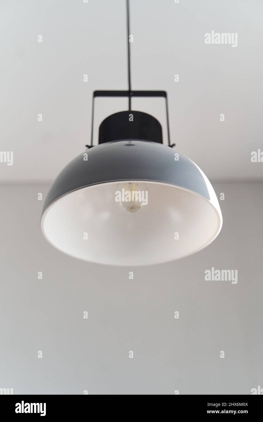 Modern gray loft chandelier. Loft style incandescent lamp Stock Photo ...
